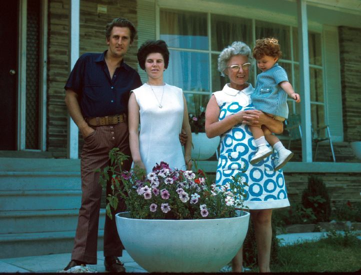  in front of their home in Toronto with Hazel and Leonard's mother holding Anita